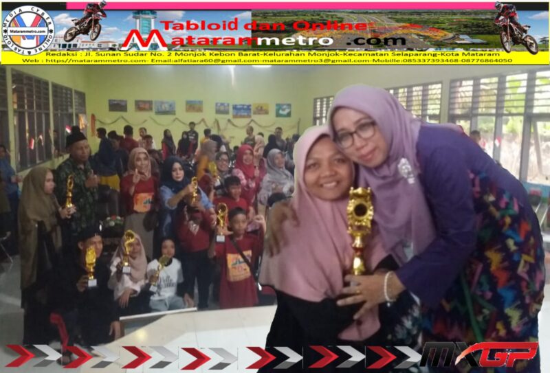 Kebudayaan (Dikbud) NTB, Dra. Hj. Eva Sofia Sari, S.Pd.,M.Pd., peluk hangat salah seorang juara FLS2N-PDBK 2023 Selasa (20/06)